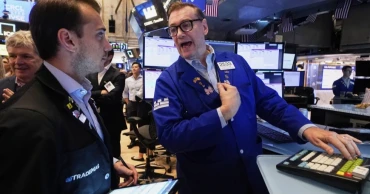 Wall Street climbs after strong iobs report, secures second weekly win