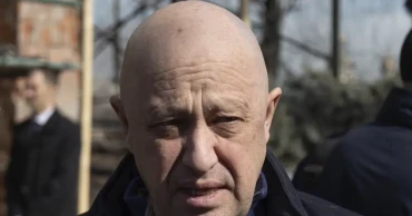 Prigozhin, the mercenary chief urging an uprising against Russia's generals, has long ties to Putin