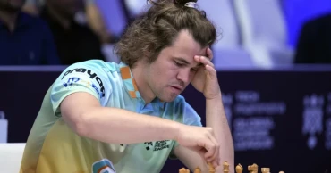 Chess grandmaster Magnus Carlsen faces showdown against ‘the world.’ Will it end in a draw?