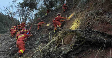 Search at China crash site suspended amid rain