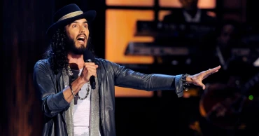 Comedian Russell Brand denies allegations of sexual assault published by three UK news organizations