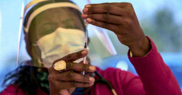 South Africa returns to stricter lockdown, virus 'surging'