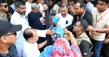 PM spends day with poor, distributes aid across Dhaka on Zia’s death anniversary