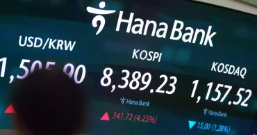 Asian shares mostly rise as Wall Street hits record highs; oil prices fall