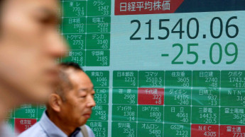  Asian markets mixed, pausing ahead of Fed chief testimony