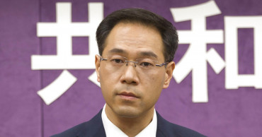 China says Beijing, US to lift tariff hikes as talks advance