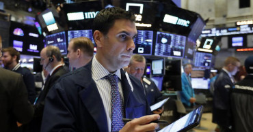 Solid earnings send stock indexes higher on Wall Street