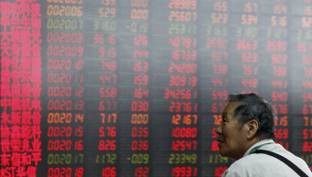 World shares advance after Fed signals US rate cut likely