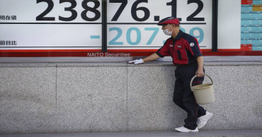 Asian stocks tumble on growing concern about China virus