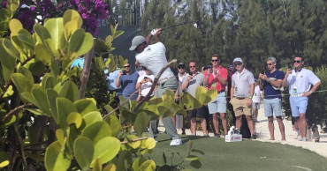 Woodland leads in the Bahamas as Tiger gets within 2 shots
