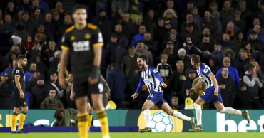 Leicester makes another title bid with 8th straight EPL win