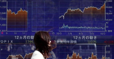 Japan's Nikkei loses ground in morning on profit-taking