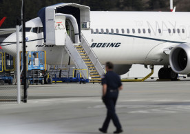 Boeing to take a $4.9 billion charge over grounded jet
