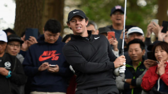 McIlroy wins HSBC Champions in a playoff over Schauffele
