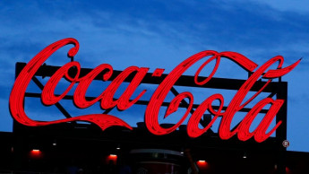 Coke shares hit all-time high as new drinks win customers