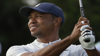 Woods withdraws from Northern Trust, citing oblique strain