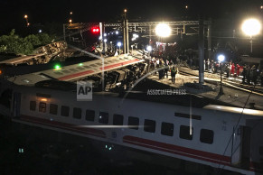 Rescuers search site after train crash killed 18 in Taiwan
