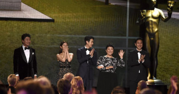 'Parasite' parties, Leo greets young fans inside SAG Awards