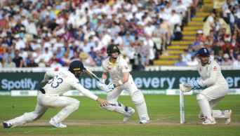 Smith guides Australia to 34-run lead with 7 wickets left