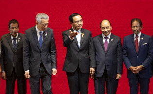 Trump absent, ASEAN charts path for trade bloc led by China