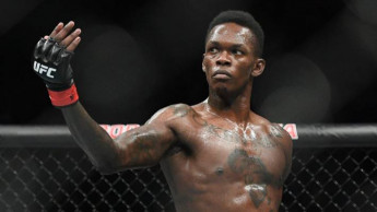 Adesanya floors middleweight champion Whittaker at UFC 243