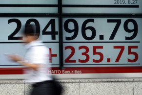  Asian shares mostly up on optimism about US-China trade war