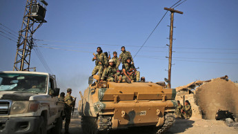 Syria's Kurds look to Assad for protection after US pullout