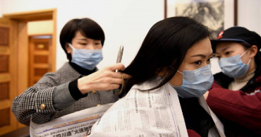 World's top virus hunter works with Chinese scientists to curb novel coronavirus outbreak