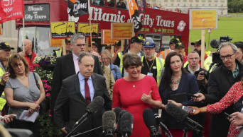 Boris Johnson visits Belfast as Brexit woes hurt UK economy