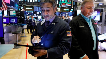 US stocks end turbulent week with broad gains