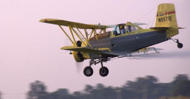 It's raining blessings! Crop duster drops holy water on town