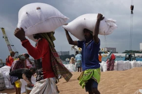 A cargo vessel carrying wheat transported by waterway from Chattogram Port is anchored at Kanchpur i