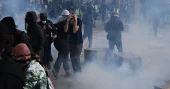 Fires, clashes erupt as protesters rally across France over living costs