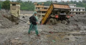Nepal-China flood survivors reach safety as families await word on nearly 3,000 missing
