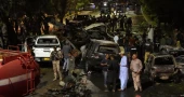 An explosion outside the Karachi, Pakistan, airport kills 2 workers from China and injures others