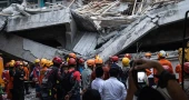 Indonesian rescuers racing against time to save students trapped in collapsed school