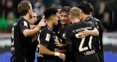 Bayern break record, extend perfect run against 10-man Gladbach