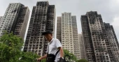 Hong Kong housing secretary resigns after fire probe finds regulatory failures