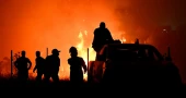 Hundreds of firefighters battle Portugal blaze; Greece issues toxic smoke alert