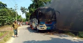 Bus torched after running over teenager in Sirajganj