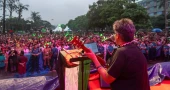 Braving rain thousands gather at Manik Mia Avenue to celebrate 36 July with music