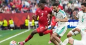 Switzerland moves on at the World Cup with a 2-0 win over Algeria