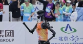 No sweat: Humanoid robots run a Chinese half-marathon alongside flesh-and-blood competitors