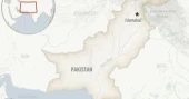 13 killed as passenger truck falls into a ravine in southern Pakistan