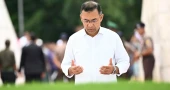 PM visits parents’ graves after maiden overseas tour