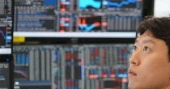 Asian markets mostly rise; Japan’s Nikkei briefly crosses 70,000 after BOJ rate hike