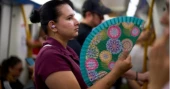 As Spain bakes, centuries-old hand fans make a comeback