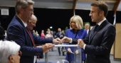 France is voting in a key election that could force Macron to share power with the far right