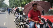 Even after price hike, fuel stations in Dhaka see long queues under intense heat