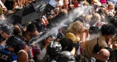 Israel-Hamas war protesters and police clash on Texas campus, Columbia University begins suspensions